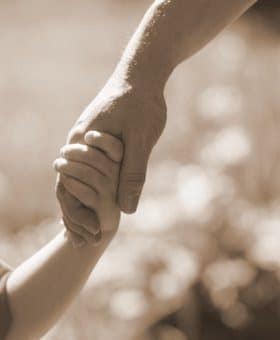 father-holding-childs-hand1-7984713